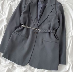 Dark grey blazer with silver chain belt